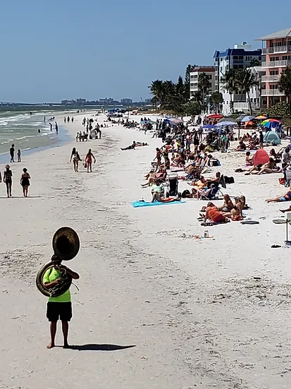 A Tuba. On the Beach.